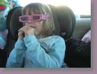 christmas 2006 - heading home - klea watching 3D movie in back seat * 2272 x 1704 * (1.97MB)